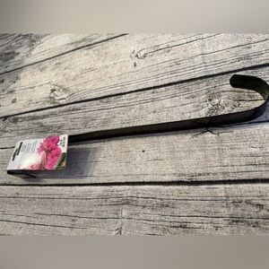 NWT. Metal wreath door hanger. New with tag, black color, useful all year!